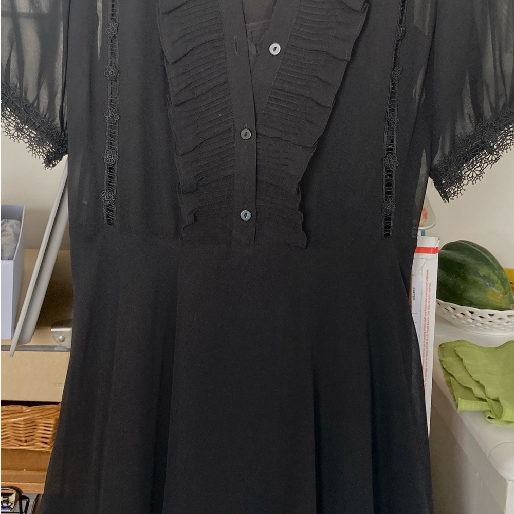 Beautiful Black sheer lace babydoll dress with built in slip by Kooples